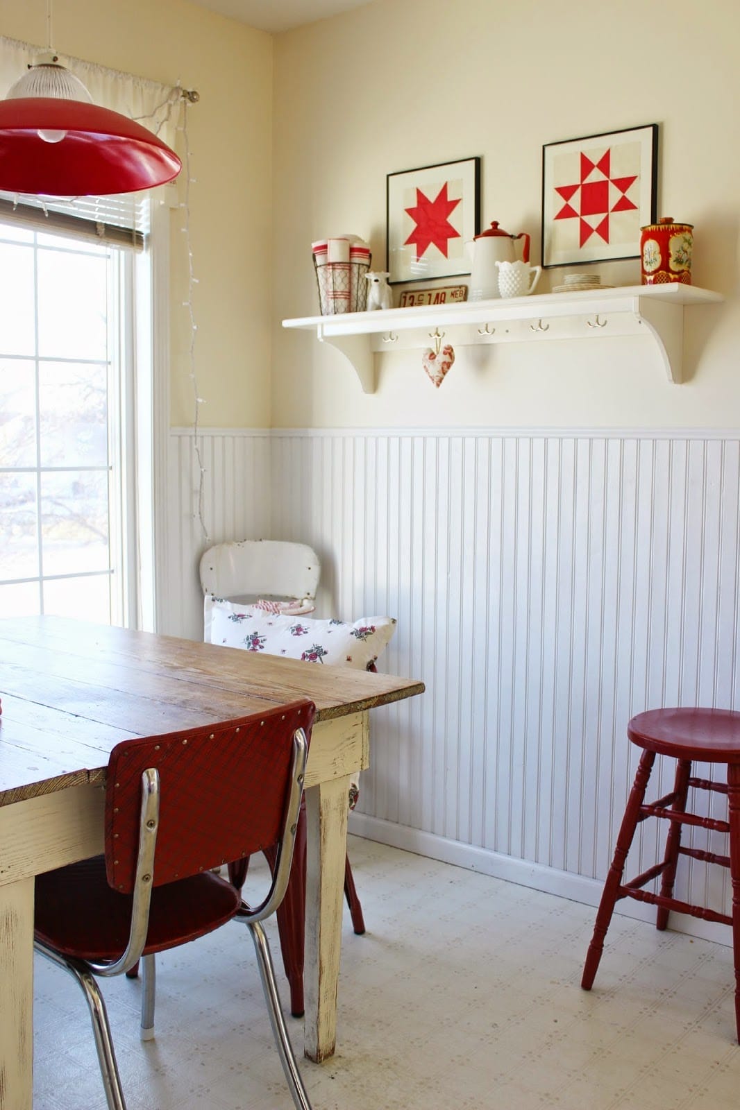 framed red and white star quilt block art